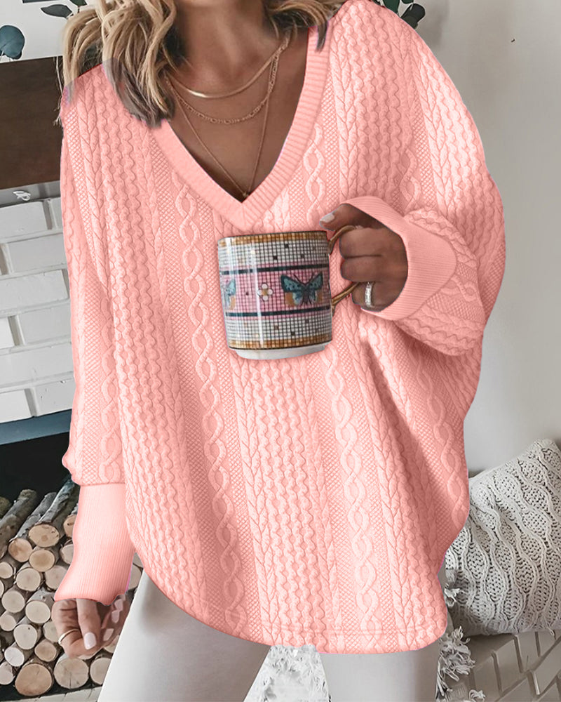 Sweater with long-sleeved design, crossed embroidery and V-neckline-3