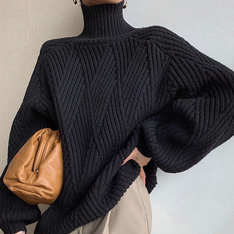 lucia-comer-schwarzer-rollkragenpullover-newberlin-mode-54310385189190.jpg?v=1715839359